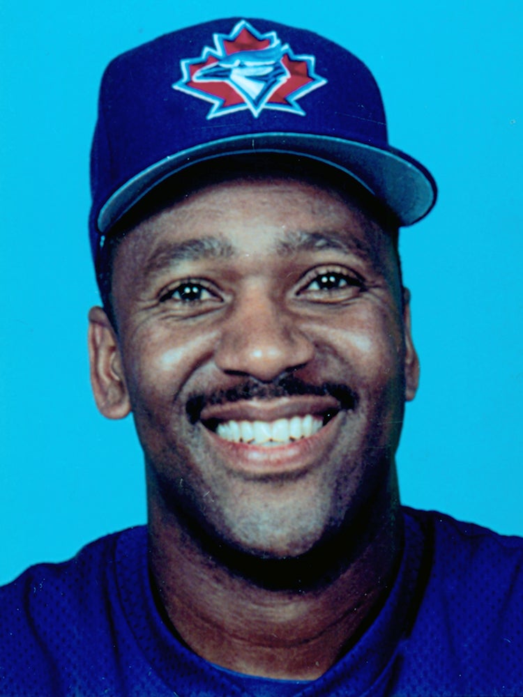 Head and shoulders portrait of Joe Carter in Blue Jays uniform